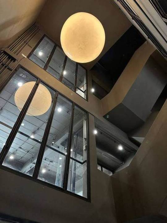 Rama 9 Soi 19 Designer Home Office: Light well with pendant lights