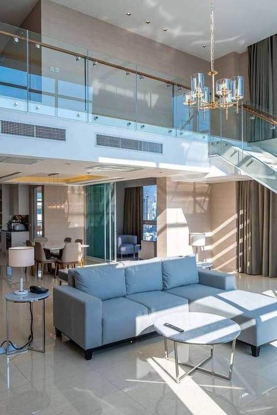 Jasmine 59 Hotel · Penthouse 1: Double-height living room
