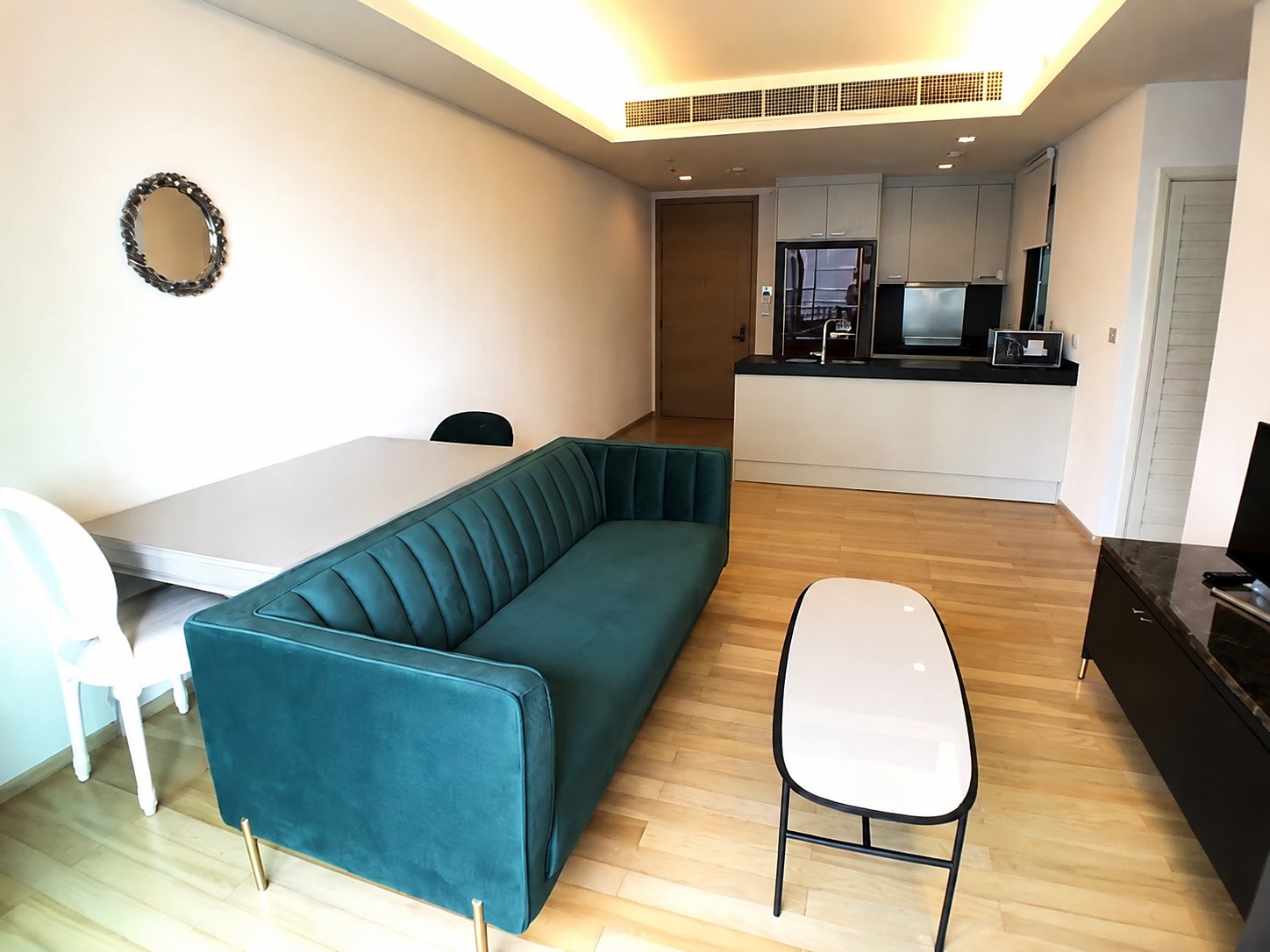 Prive by Sansiri: Living room and kitchen