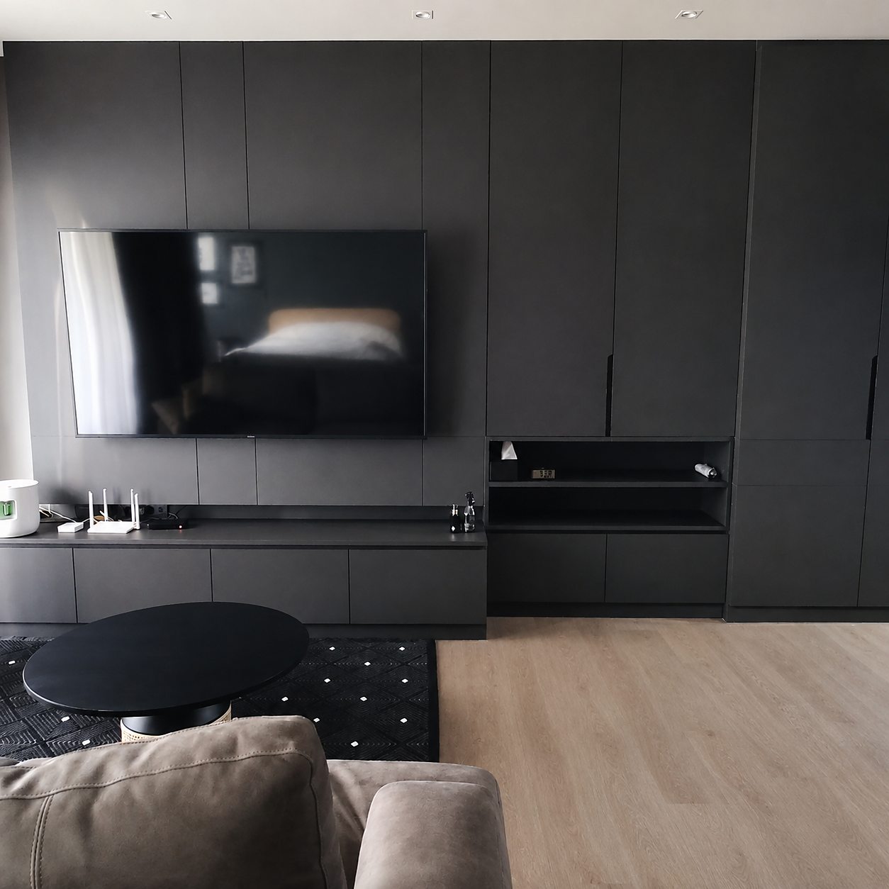 The Address Chidlom: TV and storage wall