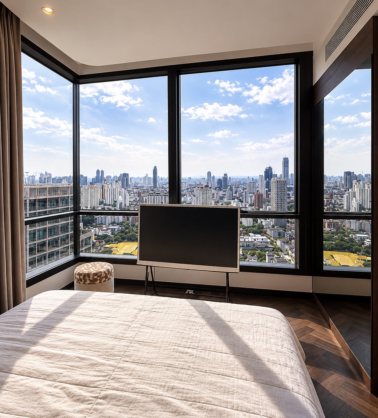 The Esse Sukhumvit 36: Master bedroom with city view