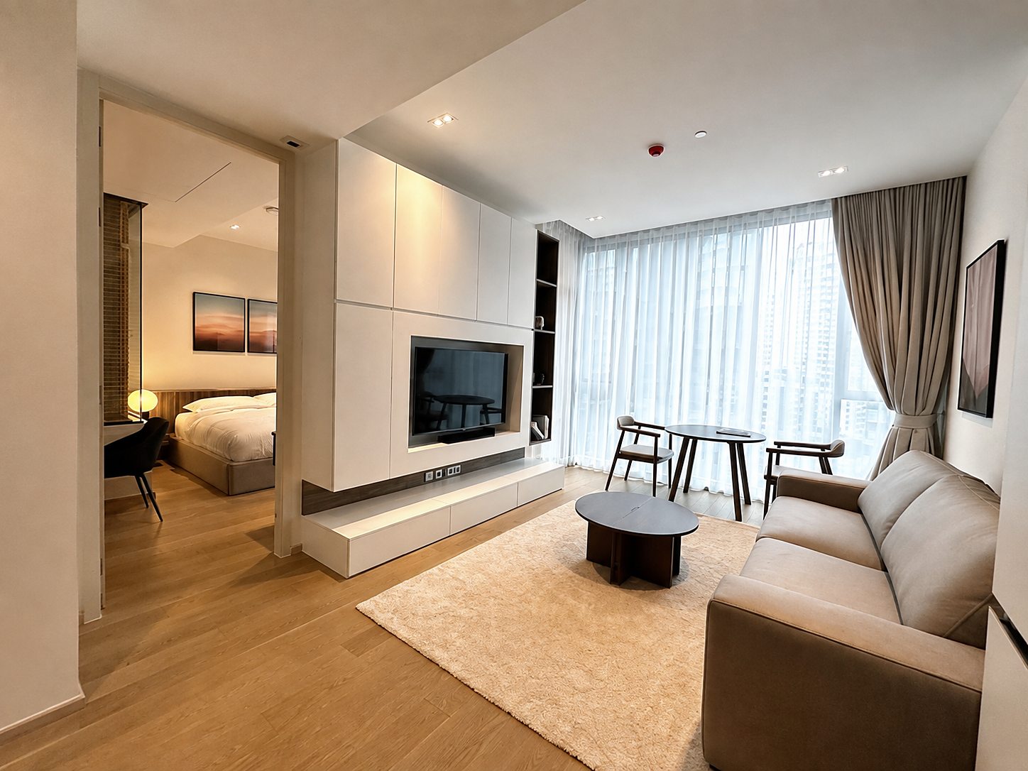 The Strand Thonglor: Living area and bedroom